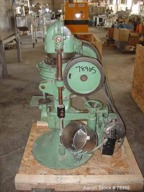 USED: Stokes rotary press, model RB2. 4 ton max pressure above and below. 16 station max. 11/16" max depth of fill, 5/8" max diameter of compact. 1-3/16" standard die diameter, compacts 360 to 650 pe...