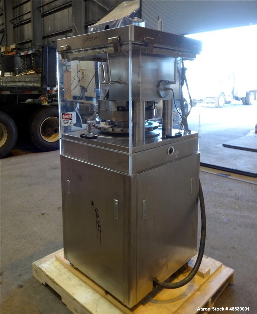 Used Vanguard Pharmaceutical Machinery Rotary Tablet Press, Model VRP1124, Approximate 9 Tons, nickle/alloy construction. Maximum approximate 93,000 tablets per hour. 24 Stations. Maximum per-compres...