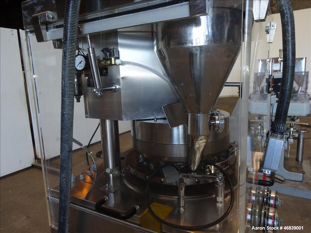 Used Vanguard Pharmaceutical Machinery Rotary Tablet Press, Model VRP1124, Approximate 9 Tons, nickle/alloy construction. Maximum approximate 93,000 tablets per hour. 24 Stations. Maximum per-compres...