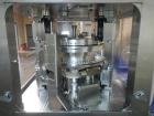 Used-Used Fette 3090i WiP rotary tablet press with containment, 75 station segmented turret, 100 Kn pre-compression, 100 Kn ...