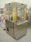 Used-Fette 1200i Rotary Pharmaceutical Tablet Press With (24-Station B-Turret) With Hydraulic Lift Transport Cart, Fette Com...