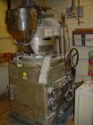 Used Manesty Rotary Tablet Press, Model RS3. 14 station, 20 ton total compression pressure. Includes tooling, punch holders, punches, dies and spare cam. Reported to be reconditioned.