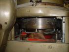 Used Manesty Rotary Tablet Press, Model RS3. 14 station, 20 ton total compression pressure. Includes tooling, punch holders, punches, dies and spare cam. Reported to be reconditioned.
