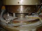 Used Manesty Rotary Tablet Press, Model RS3. 14 station, 20 ton total compression pressure. Includes tooling, punch holders, punches, dies and spare cam. Reported to be reconditioned.