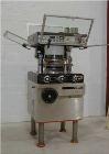 USED: Manesty 27 station rotary tablet press, model Unipress. Unitwas manufactured in the late 1980's. This is a CGMP designed machinewhich features stainless steel soundproof cabinet with plexiglass...