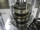 Used Riva Piccola Bi Layer rotary tablet press, model PI-BB-11, 11 station, 60 Kn main compression, 5 Kn precomprssion, keyed upper punch guide, force feeders on each layer, 16 mm max tablet diameter...