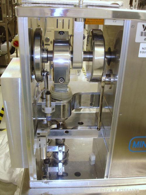 Used Riva MiniPress Single Station Tablet Press, Model MII. 60Kn (6 Ton) Compression pressure, 24mm max tablet diameter, 18mm max depth of fill, rated up to 6000 tablets/hour.