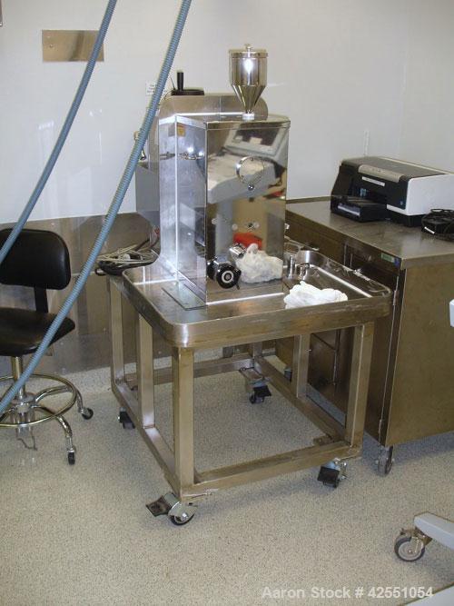 Used Riva MiniPress Tablet Press, single station, 60 Kn compression pressure, 24mm max tablet diameter, 18mm max depth of fill, rated up to 6000 tablets/hour, provision for softwall containment. AS I...