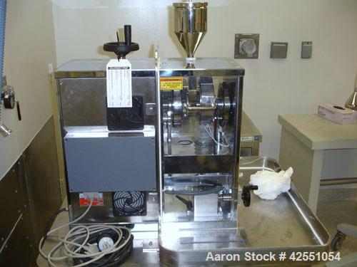 Used Riva MiniPress Tablet Press, single station, 60 Kn compression pressure, 24mm max tablet diameter, 18mm max depth of fill, rated up to 6000 tablets/hour, provision for softwall containment. AS I...