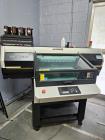 Mimaki UJF 6042 MKii Tabletop UV Printer and Summa F1612 Flatbed Cutter.