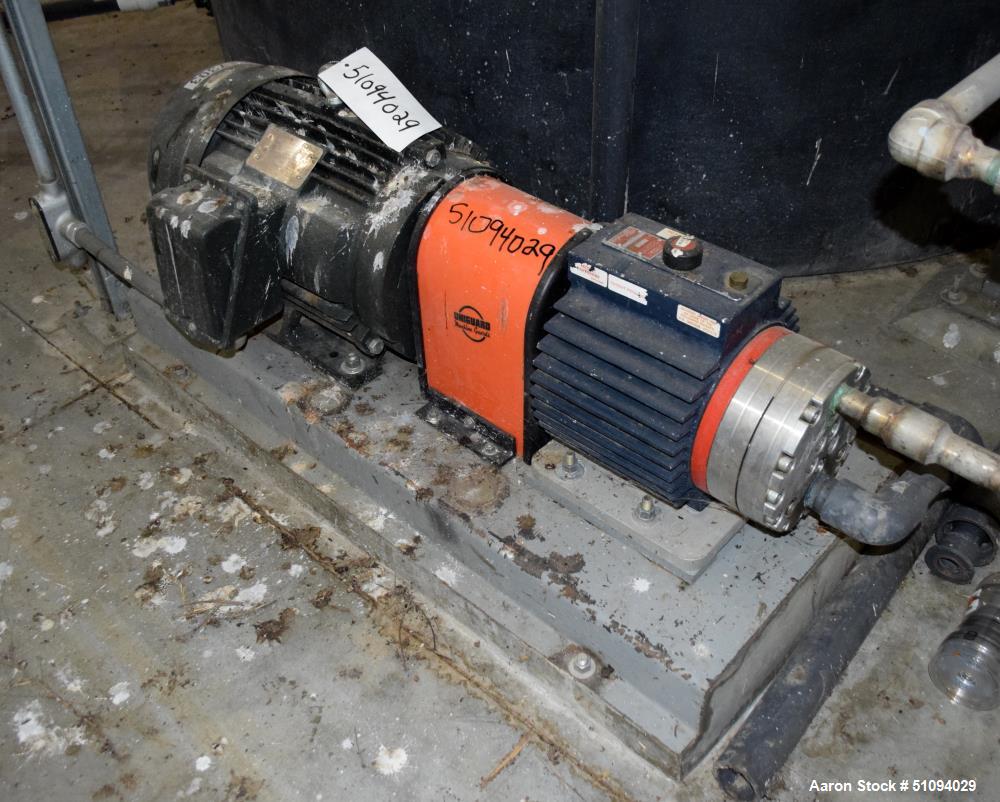Used Hydra-Cell Diaphragm Pump, Model D15XASTNNECB, 316L Stainless Steel. Maximum flow 13.8 gallons per minute at 1450 rpm. 1-1/4" NPT Inlet, approximate 3/4" NPT outlet. Driven by a 10hp, 3/60/230/4...