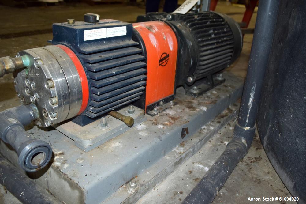 Used Hydra-Cell Diaphragm Pump, Model D15XASTNNECB, 316L Stainless Steel. Maximum flow 13.8 gallons per minute at 1450 rpm. 1-1/4" NPT Inlet, approximate 3/4" NPT outlet. Driven by a 10hp, 3/60/230/4...