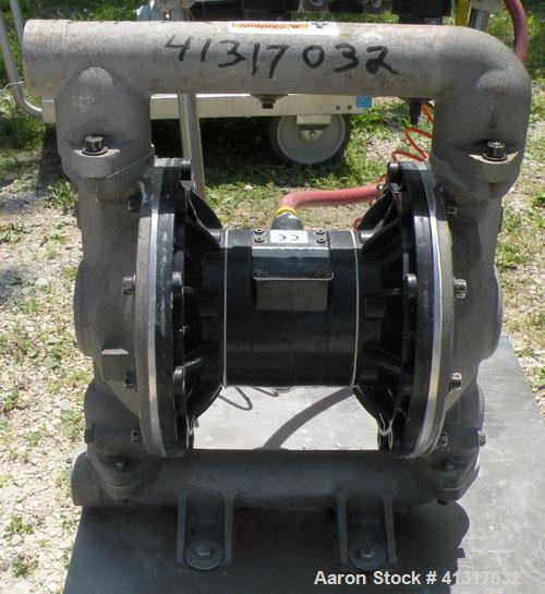 Used Husky Air Operated Double Diaphragm Pump, Series B99A, 316 Stainless Steel. 2" NPT inlet/outlet.  Rated maximum 100 gallons per minute, 120 psi.  Mounted on a carbon steel cart with casters.
