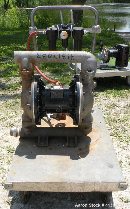 Used Husky Air Operated Double Diaphragm Pump, Series B99A, 316 Stainless Steel. 2" NPT inlet/outlet.  Rated maximum 100 gallons per minute, 120 psi.  Mounted on a carbon steel cart with casters.
