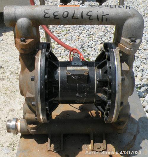 Used Husky Air Operated Double Diaphragm Pump, Series B99A, 316 Stainless Steel. 2" NPT inlet/outlet.  Rated maximum 100 gallons per minute, 120 psi.  Mounted on a carbon steel cart with casters.