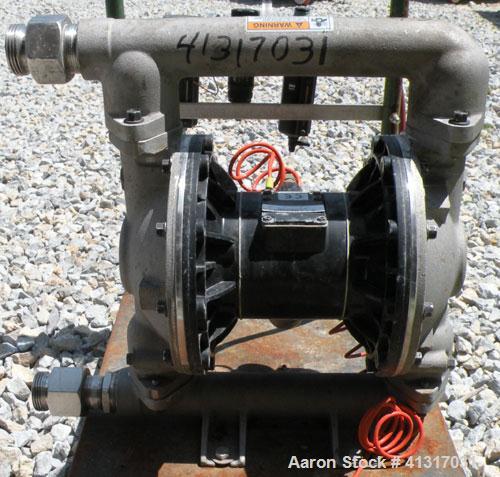 Used Husky Air Operated Double Diaphragm Pump, Series E98A, 316 Stainless Steel. 2" NPT inlet/outlet.  Rated maximum 100 gallons per minute, 120 psi.  Mounted on a carbon steel cart with casters.