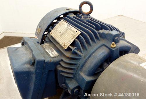 Used Hydra-Cell Diaphragm Pump, Model D10SLSJHEEMG, 316L  Stainless Steel. Maximum flow 6 gallons per minute. 1" NPT Inlet, approximate 3/4" NPT outlet. Driven by a 5hp, 3/60/230/460 volt, 1770 rpm m...