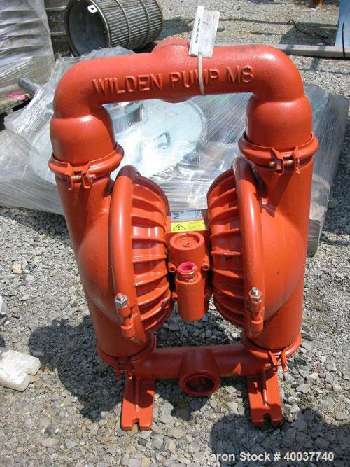 Unused- Wilden Air Operated Double Diaphragm Pump, Model M8, carbon steel construction. Rated approximately 156 gallons per minute, 125 psi, 2" inlet/outlet.

