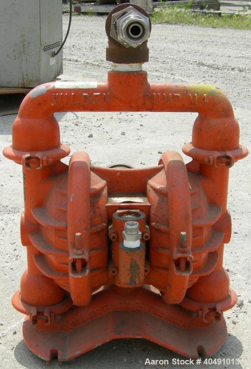 Used Wilden Air Operated Double Diaphragm Pump, model M4, aluminum construction. Rated approximately 70 gallons per minute, 3/16" maximum solids handling. 1 1/2" inlet, 1 1/4" outlet.