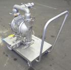 Used Wilden Air Operated Double Diaphragm Pump, Model M8, 316 Stainless Steel. Rated approximately 135 gallons per minute, 1/4
