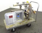 Used Wilden Air Operated Double Diaphragm Pump, Model A8T/SAAA/FG/FG/FG/129, 316 Stainless Steel. Rated approximate 111 gallons per minute, 1/4