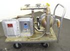 Used Wilden Air Operated Double Diaphragm Pump, Model A8T/SAAA/FG/FG/FG/129, 316 Stainless Steel. Rated approximate 111 gallons per minute, 1/4