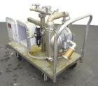 Used Wilden Air Operated Double Diaphragm Pump, Model A8T/SAAA/FG/FG/FG/129, 316 Stainless Steel. Rated approximate 111 gallons per minute, 1/4