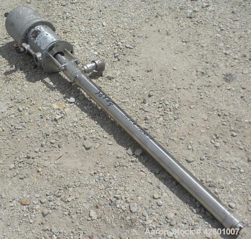 Used Graco Drum Pump, Model 207-352, Series G01F, 304 stainless steel. Approximately 42" long shaft, open design. Rated approximately 3 gallons per minute, ratio 10 to 1.