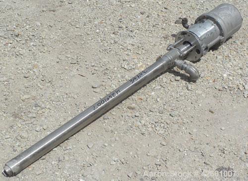 Used Graco Drum Pump, Model 207-352, Series G01F, 304 stainless steel. Approximately 42" long shaft, open design. Rated approximately 3 gallons per minute, ratio 10 to 1.