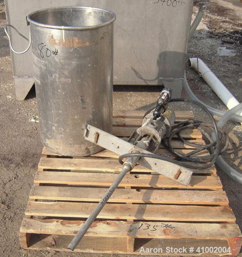 Used Graco Air Operated President Drum Pump, Model 224-348, Series L92A, 304 stainless steel. Rated 3 gallons per minute at 180 psi. Ratio 10:1. Includes a 30 gallon 304 stainless steel tank. 17 1/2"...