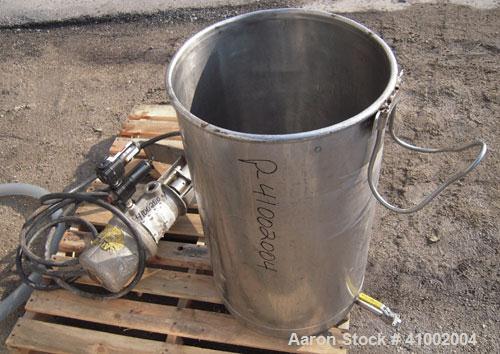 Used Graco Air Operated President Drum Pump, Model 224-348, Series L92A, 304 stainless steel. Rated 3 gallons per minute at 180 psi. Ratio 10:1. Includes a 30 gallon 304 stainless steel tank. 17 1/2"...