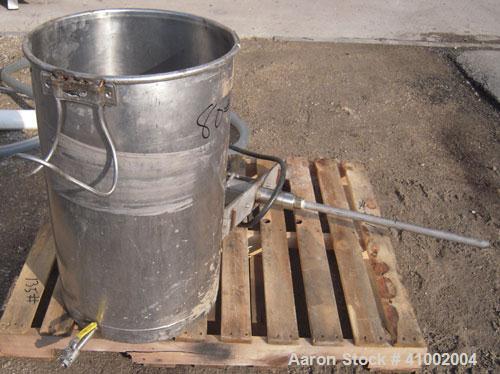 Used Graco Air Operated President Drum Pump, Model 224-348, Series L92A, 304 stainless steel. Rated 3 gallons per minute at 180 psi. Ratio 10:1. Includes a 30 gallon 304 stainless steel tank. 17 1/2"...