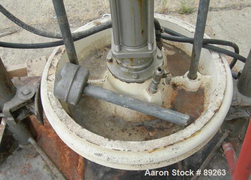 USED: Graco air operated drum unloading pump, model 951-264, series 207-172. Approximately 10 gallons per minute at 60 psi, 10:1 ratio. Approximate 23" diameter carbon steel plunger. Base mounted.