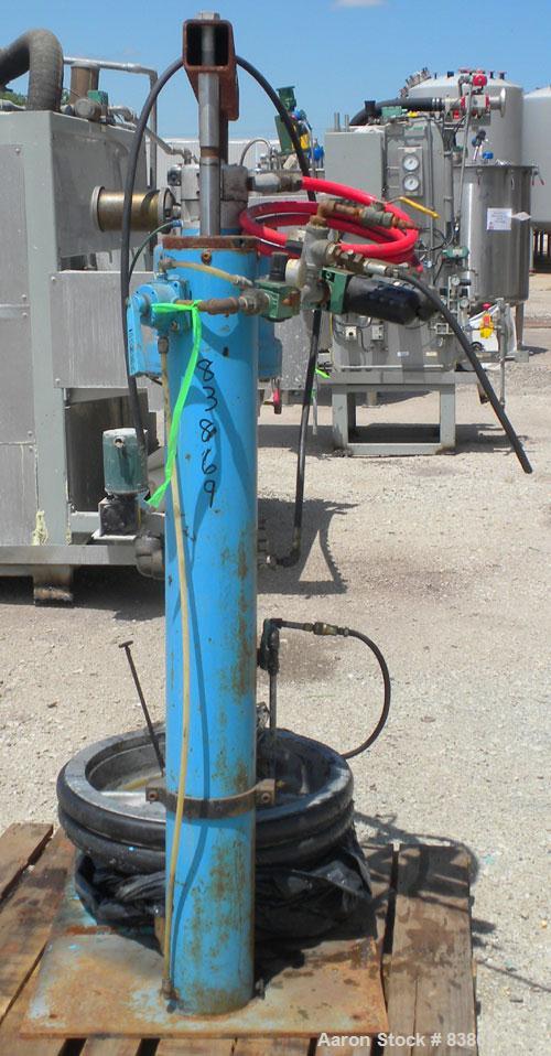 Used Johnstone Air Operated 55 Gallon Drum Unloading Pump, Model 98KLXGC3AX. 8" Air motor, ratio 42:1, 20 psi to 100 psi operating range, 12 cubic inch volume per cycle. Base mounted.