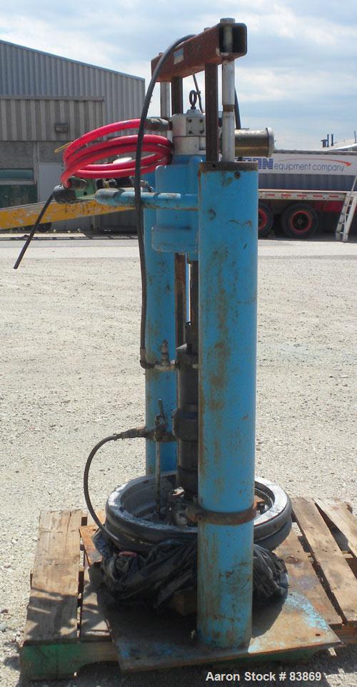 Used Johnstone Air Operated 55 Gallon Drum Unloading Pump, Model 98KLXGC3AX. 8" Air motor, ratio 42:1, 20 psi to 100 psi operating range, 12 cubic inch volume per cycle. Base mounted.