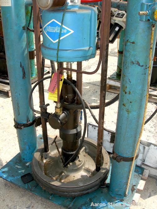 Used Johnstone Air Operated 55 Gallon Drum Unloading Pump, Model JPC 1001, Size S1-8-HDE. 8" Air motor, ratio 42:1, 20 psi to 100 psi operating range, 12 cubic inch volume per cycle. Base mounted.