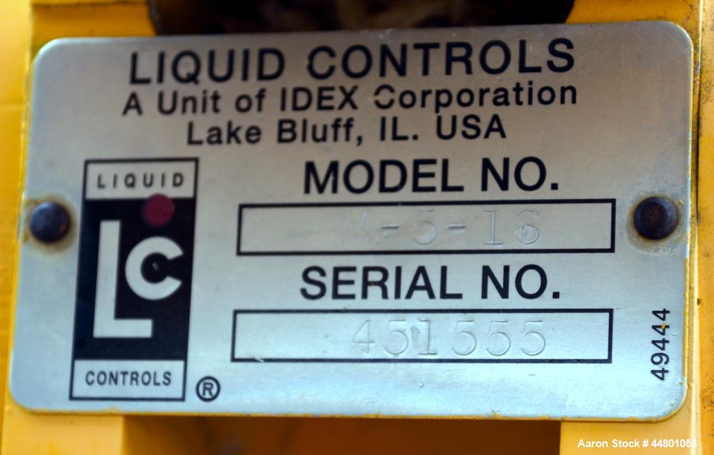 Used Liquid Controls Metering Pump, Model M-5-16, Carbon Steel. Serial #451555. Includes a Smith Meter Accuload III panel.
