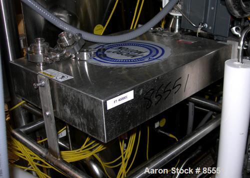 Used Micro Motion Flow Meter, Model DL65S242SU, 316 Stainless Steel Product Contact Areas. Flow cal 20.6984.26, dens flow 11300132894.21. Rated volume 0 to 15 gallons per minute, mass 0 to 125 pounds...
