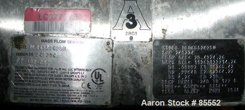 Used Micro Motion Flow Meter, Model DL65S242SU, 316 Stainless Steel Product Contact Areas. Flow cal 20.4324.26, dens flow 11363133714.26. Rated volume 0 to 15 gallons per minute, mass 0 to 125 pounds...