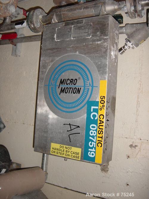 Used Micro Motion Flow Meter, Model DS100H134, Type 25, Factor 18676, Stainless Steel. 1" Inlet/outlet. Temp range -240 deg C to 204 deg C. Tube pressure 1500 psig @ 25 deg C. Conn pressure 275 psig ...