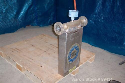 USED: Micro Motion flow meter model DS150S141SU, stainless steelproduct contact areas. Flow cal 176.415.13, dens flow 09743117424.44.Rated volume 0 to 168 gallons per minute, mass 0 to 1400 pounds pe...