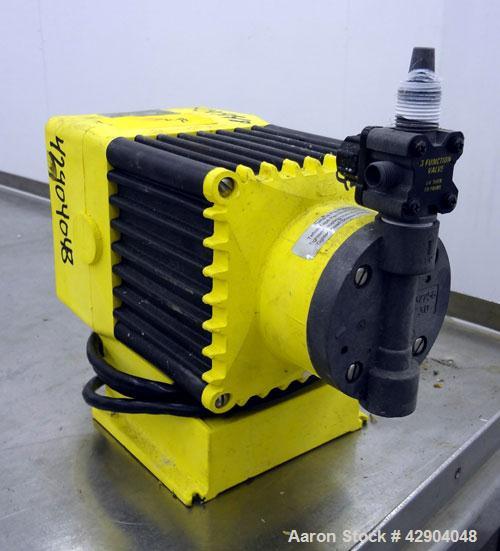 Used- LMI Milton Roy Chemical Metering Pump, Model B141-318TI. PVC molded head. Rated 0.007 gallons per minute (7 gallons pe...