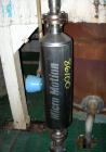 Used Micro Motion Straight Tube Flow Meter, model T150T641SQBAEZZZ. 316L stainless steel product contact areas. Rated volume 0 to 383 gallons per minute, mass 0 to 3200 pounds per minute. 1-1/2