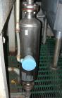 Used Micro Motion Straight Tube Flow Meter, model T150T641SQBAEZZZ. 316L stainless steel product contact areas. Rated volume 0 to 383 gallons per minute, mass 0 to 3200 pounds per minute. 1-1/2