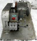 USED- Cat Triplex Piston Pump, Model 1050, 316 Stainless Steel. Approximately 10 gallons per minute. 1
