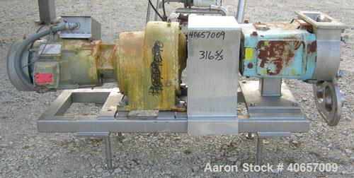 Used Waukesha Rectangular Flange Universal Rotary Positive Displacement Pumpmodel 224, 316 stainless steel. Approximately 200 gallons per minute at 200 psi at 400 rpm capacity, .522 gallon displaceme...