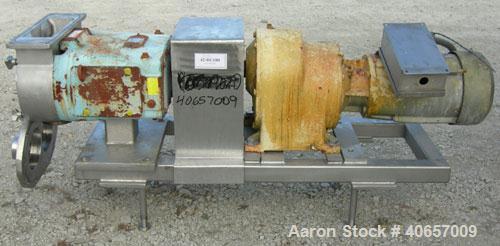 Used Waukesha Rectangular Flange Universal Rotary Positive Displacement Pumpmodel 224, 316 stainless steel. Approximately 200 gallons per minute at 200 psi at 400 rpm capacity, .522 gallon displaceme...