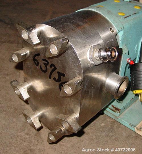 Used Waukesha rotary positive displacement pump, model 30, stainless steel. Approximate capacity 36 gallons per minute at 600 rpm. 1 1/2" tri-clamp inlet/outlet. Jacketed front cover. Driven by a 1 h...