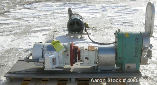 Used Tri-Clover Rotary Positive Displacement Pump, 316 stainless steel. Approximately 60 gallons per minute at 20 psi. 3" tri-clamp inlet/outlet. (2) 4 lobe stainless steel rotors. Driven by a 5 hp, ...