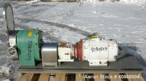 Used Tri-Clover Rotary Positive Displacement Pump, 316 stainless steel. Approximately 60 gallons per minute at 20 psi. 3" tri-clamp inlet/outlet. (2) 4 lobe stainless steel rotors. Driven by a 5 hp, ...